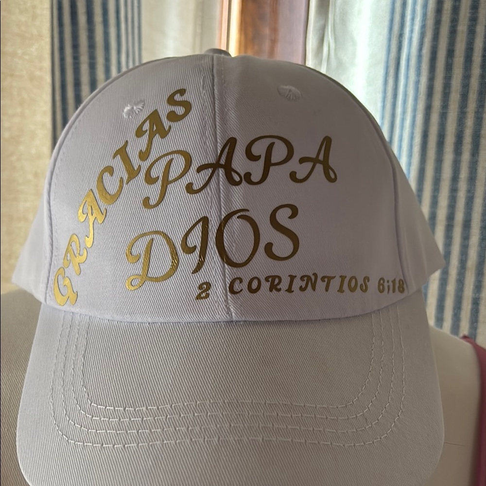 White Cap with Gold Text